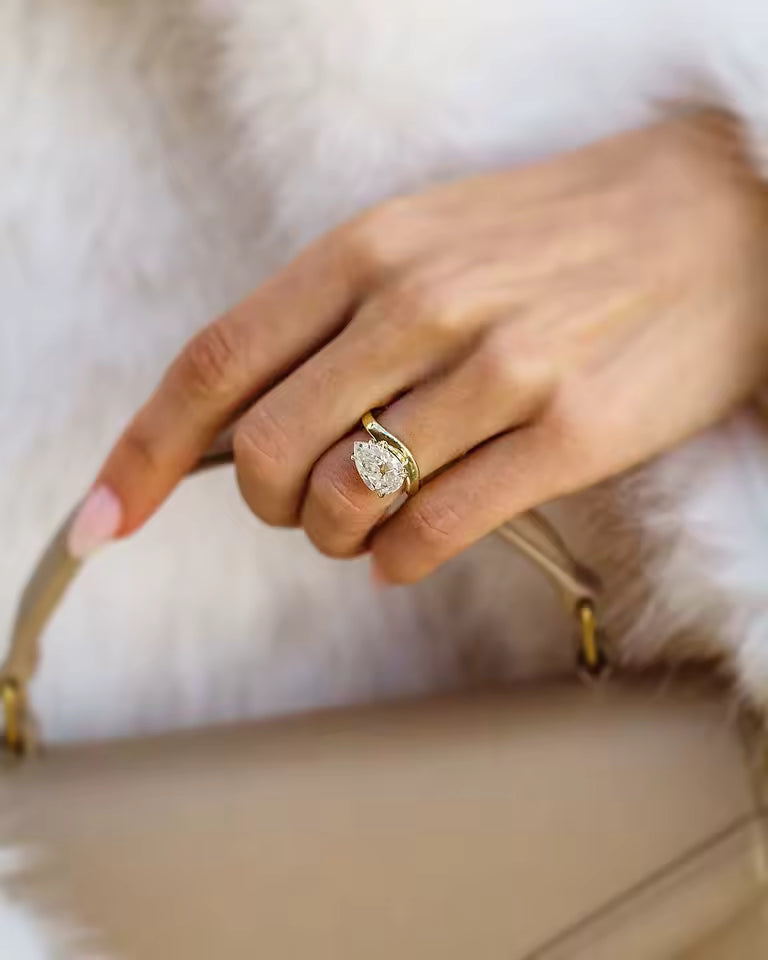 ORAYA | East West Old Mine Pear Cut 4 Carat Moissanite Ring