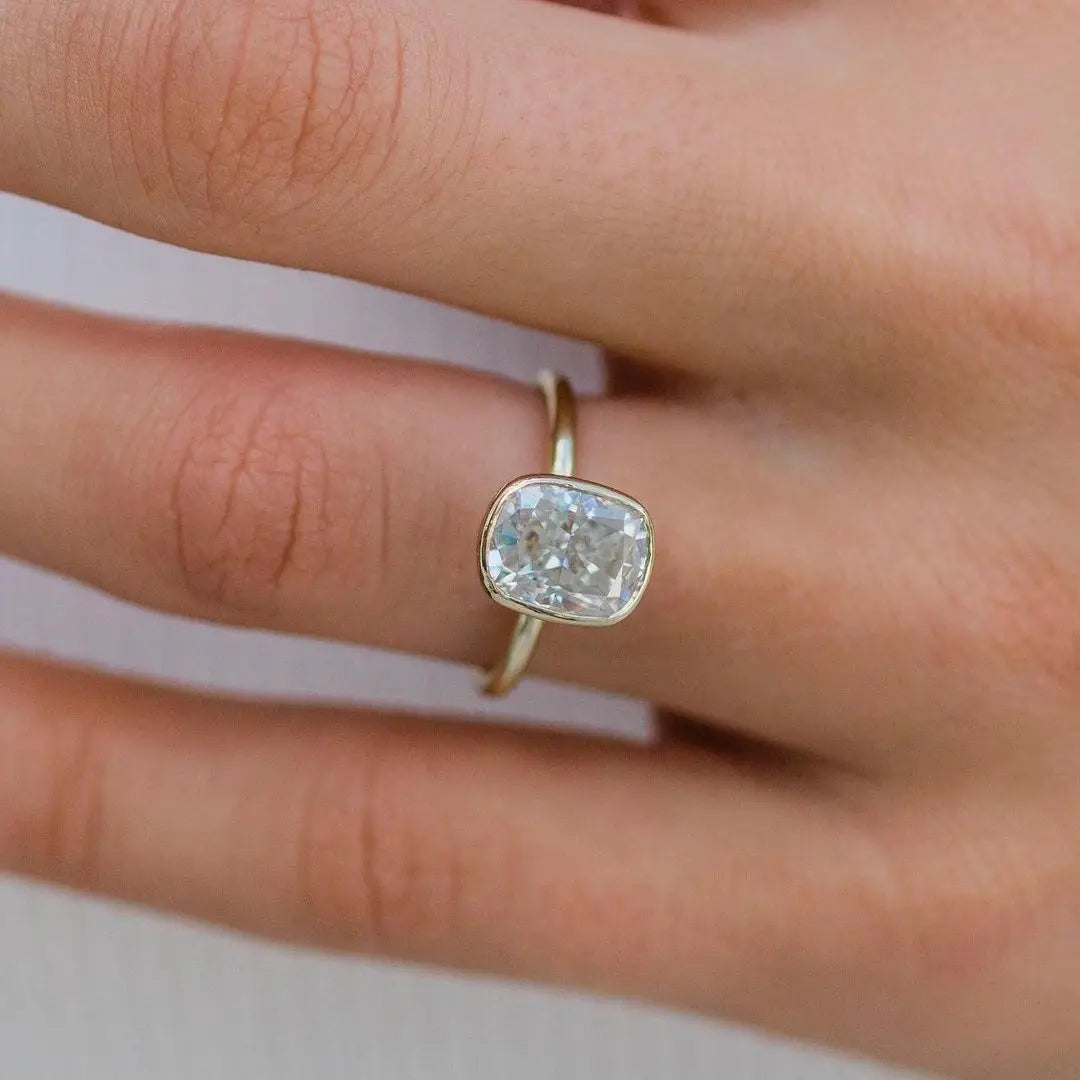 (CUSTOM) EMBLA | 3.5 Carat Moissanite Crushed Ice Cushion Cut Bezel Solitaire | Hidden Halo