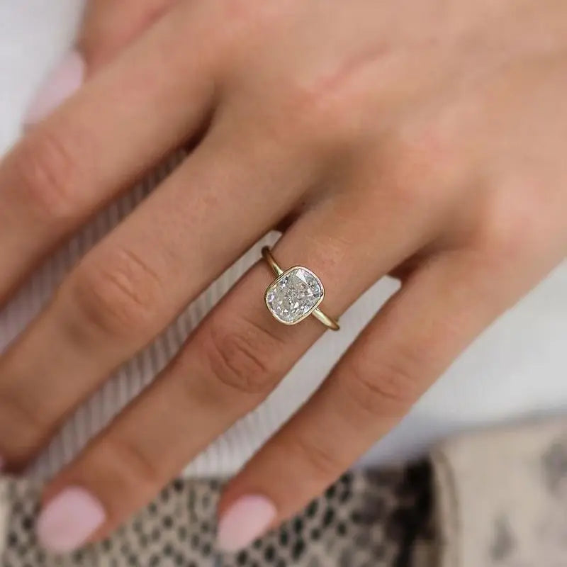 (CUSTOM) EMBLA | 3.5 Carat Moissanite Crushed Ice Cushion Cut Bezel Solitaire | Hidden Halo