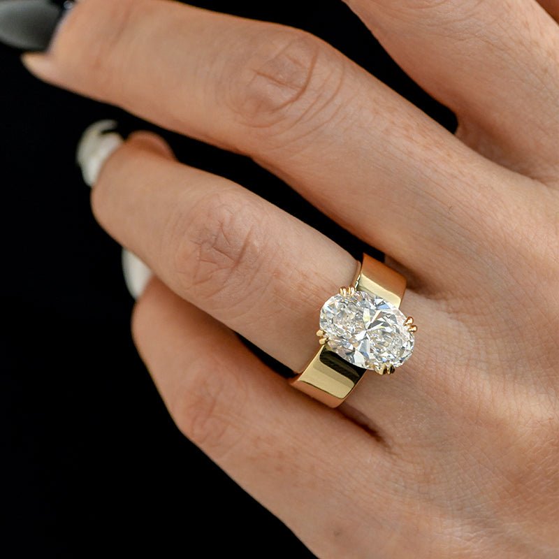 TORUNN | 2.5 Carat Crushed Ice Oval Cut | 14k Yellow Gold Cigar Band 6mm Flat Solitaire